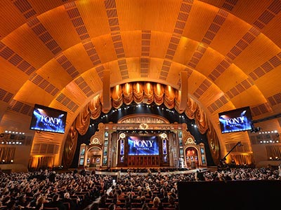 Attend the Tony Awards