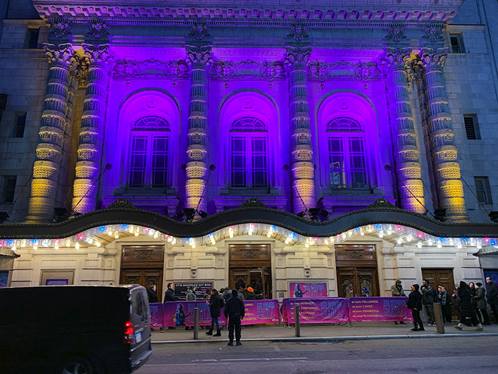 Vivid purple lighting on the Lyceum facade