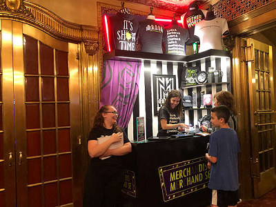 Merch stand outside the entrance