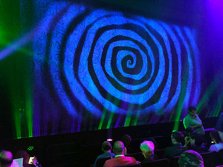 Black-and-white spiral curtain during intermission