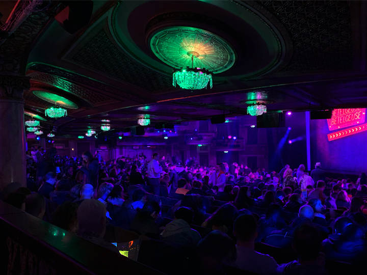 The auditorium drenched in Burton-esque color