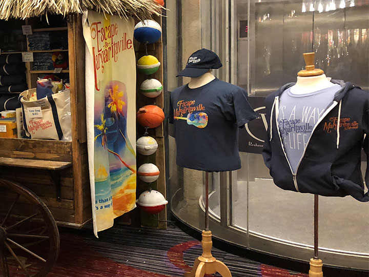 Merch shop on the second floor near the entrance