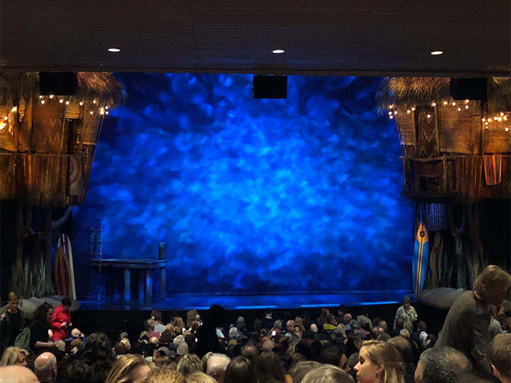 Stage before curtain with ocean lighting effects