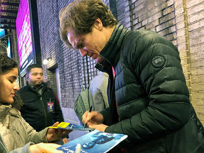 Michael Shannon signing with his trademark furrowed focus