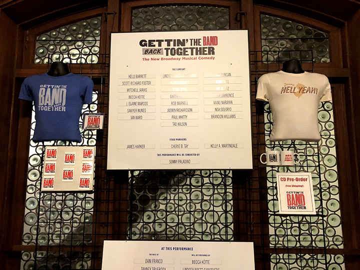 Merch stand just inside the main entrance on the left