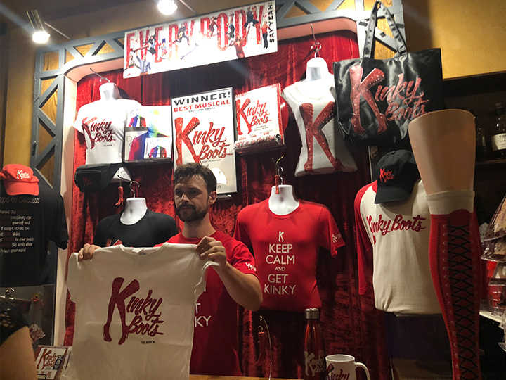 Main lobby merch stand featuring T shirts and apparel