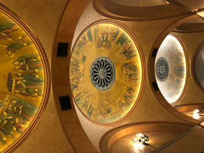 Lobby ceiling with a trio of dome lights just inside the entrance