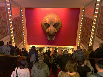 Mufasa sculpture above the escalators inside the Minskoff