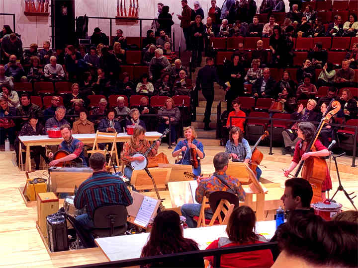 Orchestra seated close to the audience at Circle in the Square