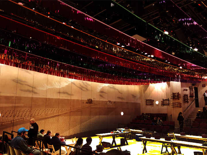 Video projected onto white walls as part of the staging