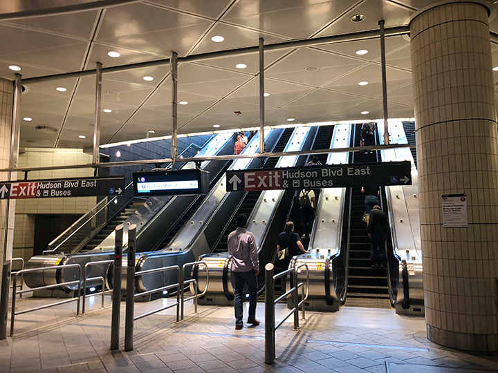 Transferring to another escalator