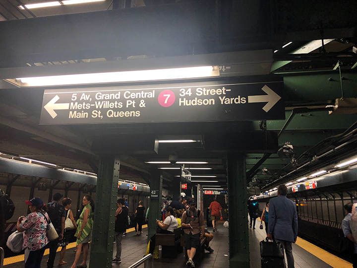 Transfer at Times Square (42nd St) to the purple 7 subway