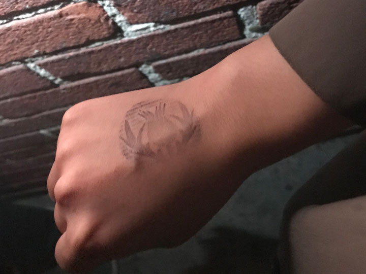 Hand stamp used to verify guests twenty one and over