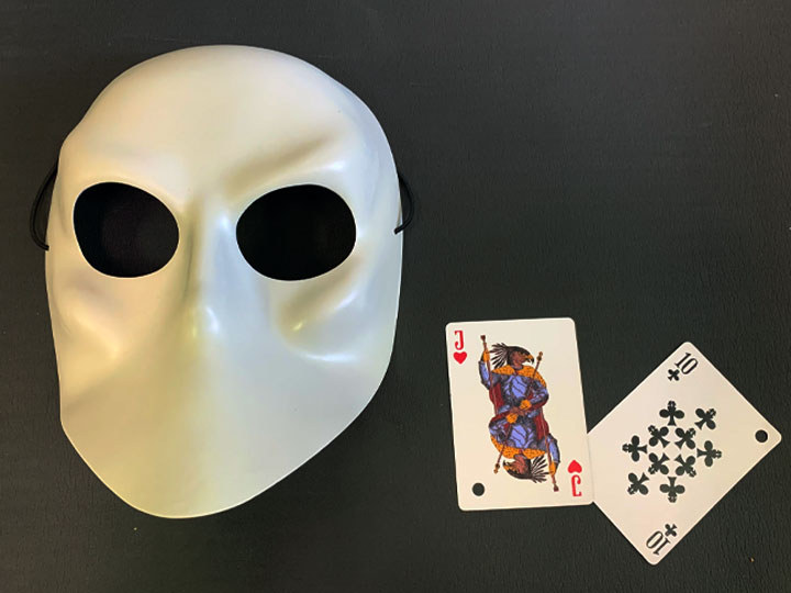 The actual playing card and mask we received