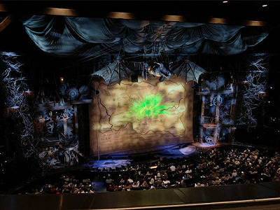 Wicked stage set with a large dragon
