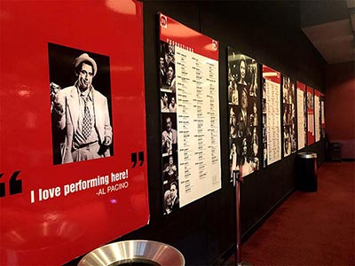 Lobby of the Circle in the Square Theatre, featuring displays about its history and actors