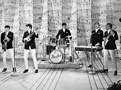 The Beatles perform on The Ed Sullivan Show in their landmark first U.S. TV appearance