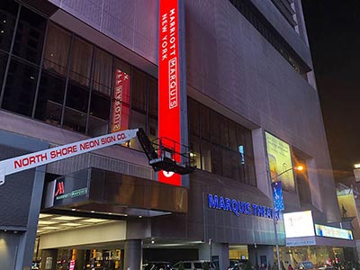 Exterior view of the Marquis Theatre inside the Marriott Marquis Hotel