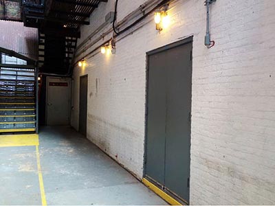The first Rent Wall was in the backstage corridor to wardrobe, accessible only to company members. It has since been repainted