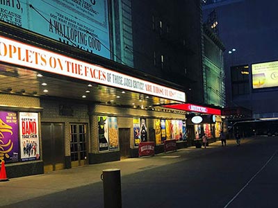 Shubert Alley stretching between 44th and 45th Streets, decorated with Broadway posters