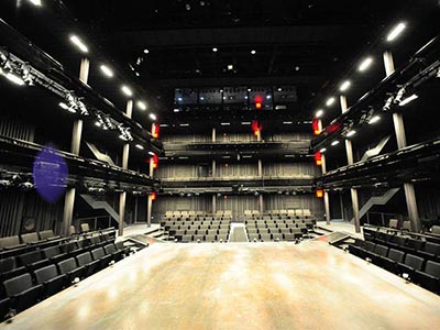 Audience seating surrounding the stage at Theatre for a New Audience