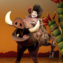 Pumbaa, a character in The Lion King Broadway musical