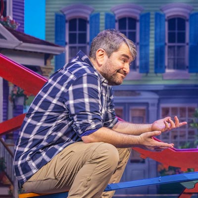 Josh, a main character in the musical Schmigadoon!